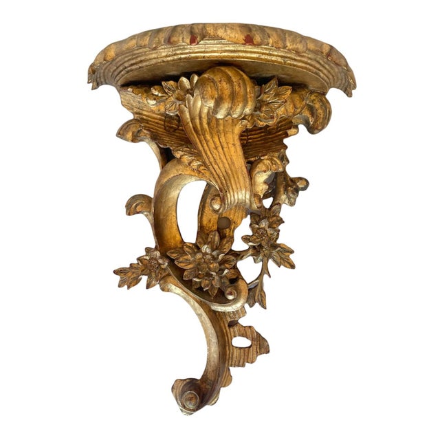 Beautifully carved and wonderfully substantial, these giltwood Italian Rococo style wall brackets promise to pack a punch...