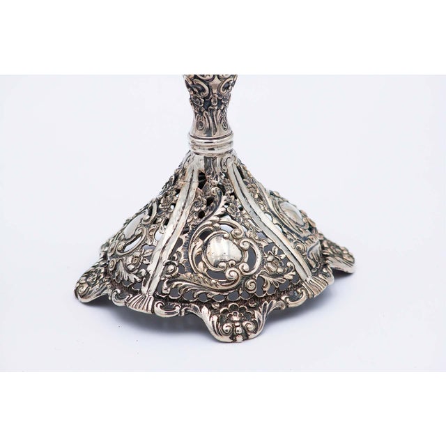 Silver Candlesticks with Embossed Stems and Sconces, Set of 2, in Very Good conditions. Designed from 2000 This piece has...