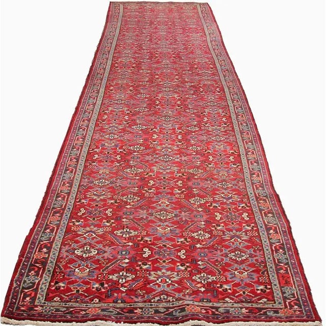 ACTUAL SIZE: 3’9″ x 19’3″ PRIMARY COLOR: Red AGE: Old MATERIALS: Wool FOUNDATION: Cotton PRODUCTION: Handwoven, Knotted...