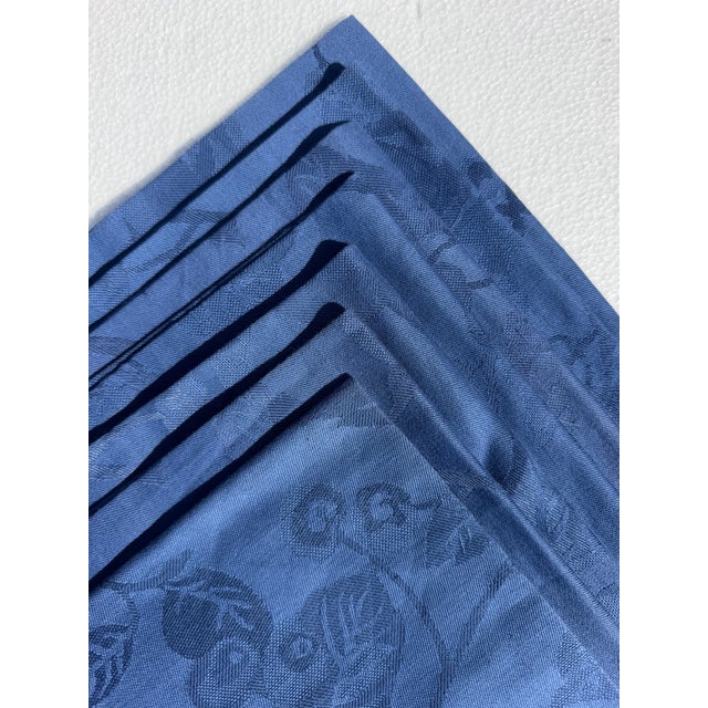 Elevate your tablescape with this striking set of 7 dinner napkins from Xochi. Drenched in a rich, saturated midnight blue...