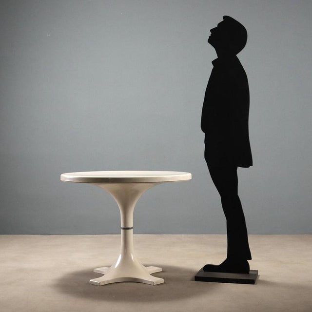 1960s table with a round top, designed by Anna Castelli Ferrieri and Ignazio Gardella for Kartell production. Made of...