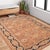 "Enhance the ambiance of your home with this magnificent Persian-influenced Turkish hand-knotted rug made by skilled...
