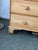 This is a beautiful English Regency pine chest featuring two small drawers over three larger ones. It has a very unique...