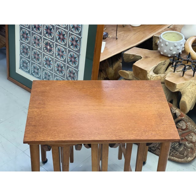 Vintage Mid Century Modern Nesting Tables on Casters. UK Import. Offered 1 Nesting Table Set as Pictured. Dimensions. 24...