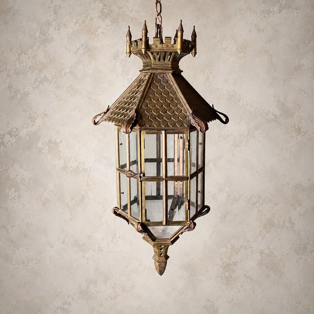 An impressive and unusual Continental Gothic Revival Bronze Lantern, standing approximately one metre tall, excluding its...