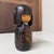 Vintage kokeshi by the renowned master Okamoto Usaburo, titled “Bakushū”. The wooden doll has an understated, elegant form...
