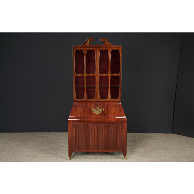 Experience the elegance of mid-20th century Italian craftsmanship with this beautifully restored secretary cabinet,...