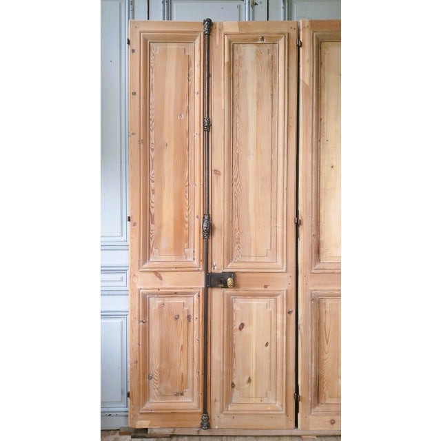 Two charming 19th-century connecting doors, adorned with magnificent Haussmann-style moldings, are double-sided and have...