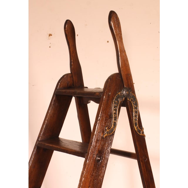 Exquisite Simplex library ladder, late 19th century It is enhanced with wrought iron reinforcements that add to its...