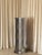 Rl 10 cylindrical pedestal in brushed aluminum by caspal dimensions: ø 38 x h 114 cm. Materials: brushed aluminum. up to...
