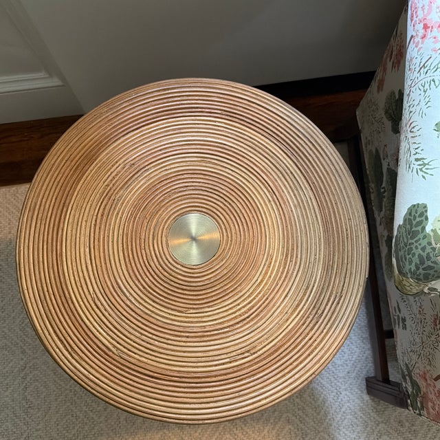 The Vickers Side Table brings natural sophistication to any space. Slender rattan is wrapped continuously around a durable...