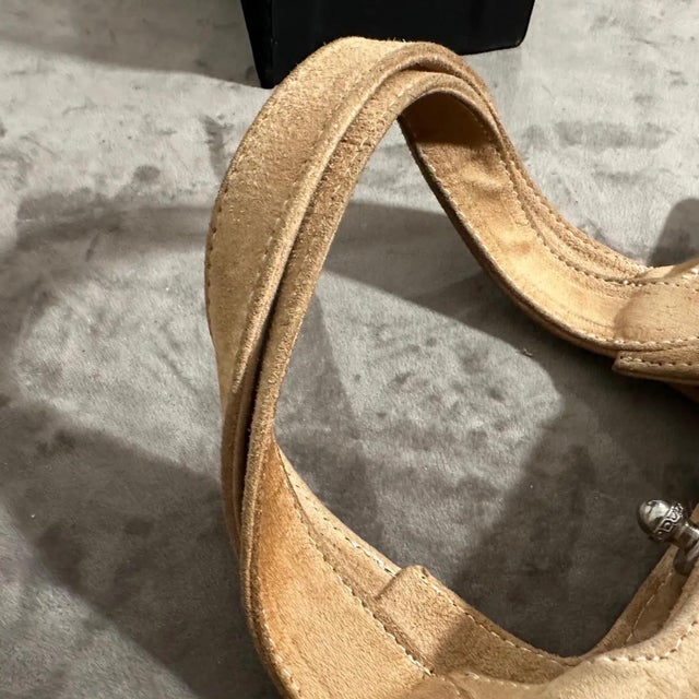 Embrace timeless sophistication with this charming 1960s vintage handbag, exquisitely crafted in Italy which captures the...