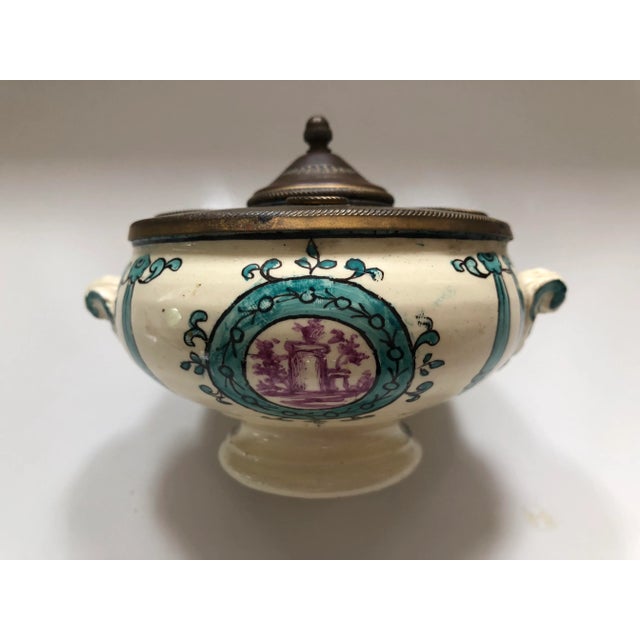 Lovely antique French soft paste porcelain and brass inkwell. Has glass insert or well for ink. Makers mark shown in...
