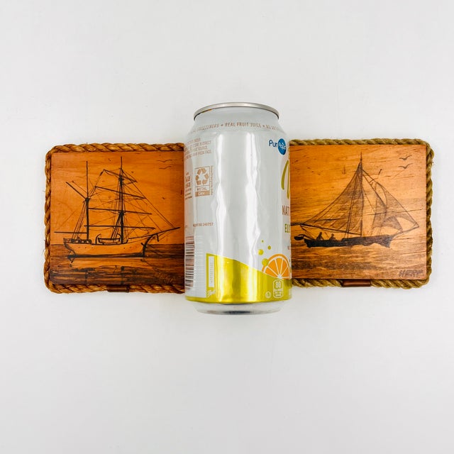Charming vintage folk art pair of pen-on-wood nautical artworks by Reinier Vanderkerp, featuring beautifully rendered...