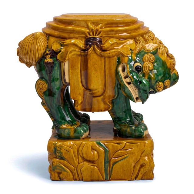 This is a pair of mid-century Chinese Export Sancai food dog form side tables, garden stools or pedestals with a wonderful...