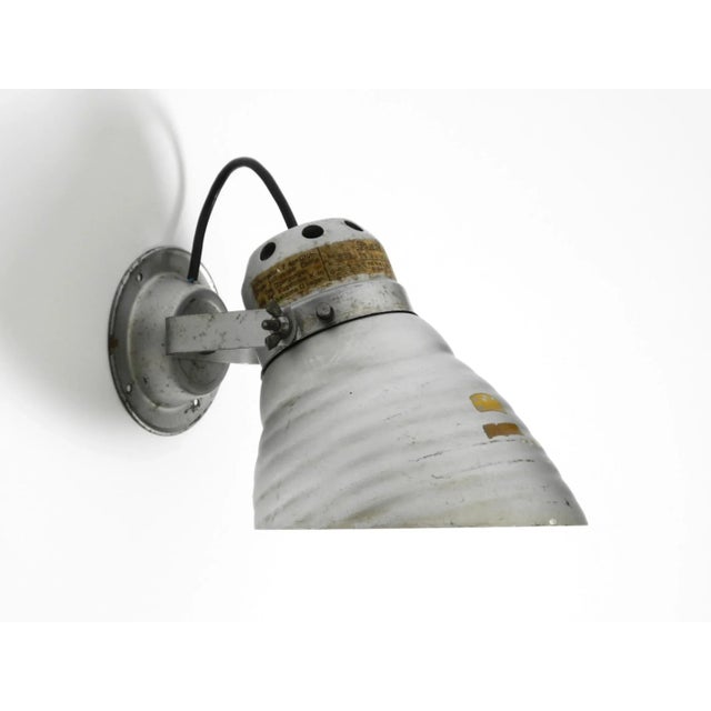 Beautiful 1930s industrial wall or ceiling lamp with a mirrored glass lampshade by adolf meyer for zeiss ikon with an...