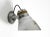 Beautiful 1930s industrial wall or ceiling lamp with a mirrored glass lampshade by adolf meyer for zeiss ikon with an...