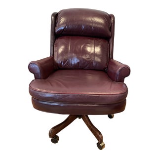 1980s Vintage Oxblood Leather Thick Padded Executive Office Armchair With Cherry Feet on Casters For Sale