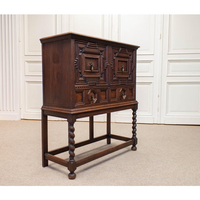 Impressive Spanish Renaissance Revival cabinet, specially commissioned for Magasin du Nord in Copenhagen during the 1920s....