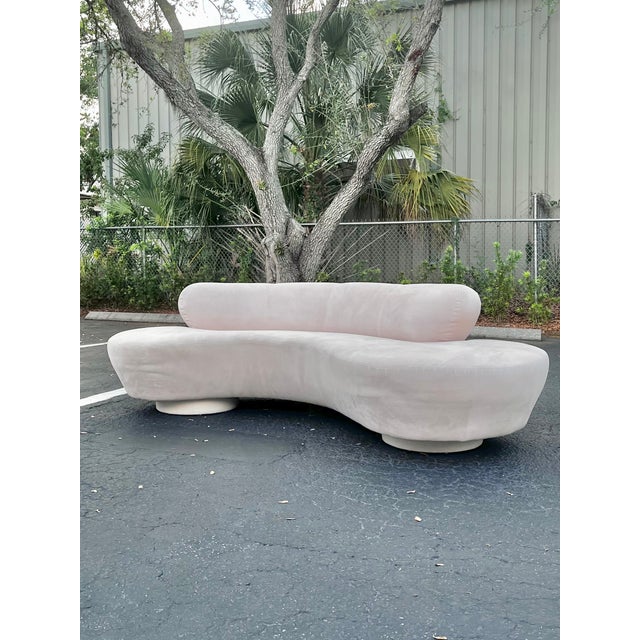 Vintage serpentine cloud sofa by Vladimir Kagan for Directional. A classic asymmetrical silhouette with the floating...