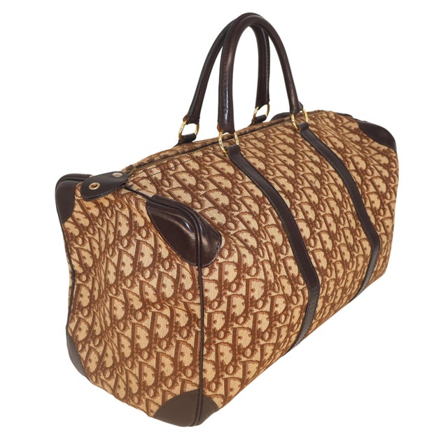 Christian Dior Brown Diorissimo Trotter Boston "Weekender" Bag, 1999. Introduced in 1967 by then creative director Marc...