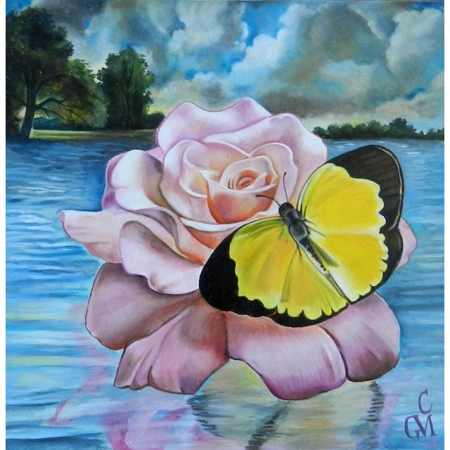 In "Drifting Dreamer," a delicate pink rose floats serenely on a shimmering body of water, capturing a moment of...