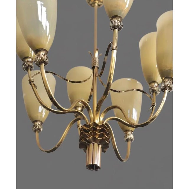 Bring timeless elegance and Scandinavian sophistication into your home with this handcrafted solid brass chandelier....
