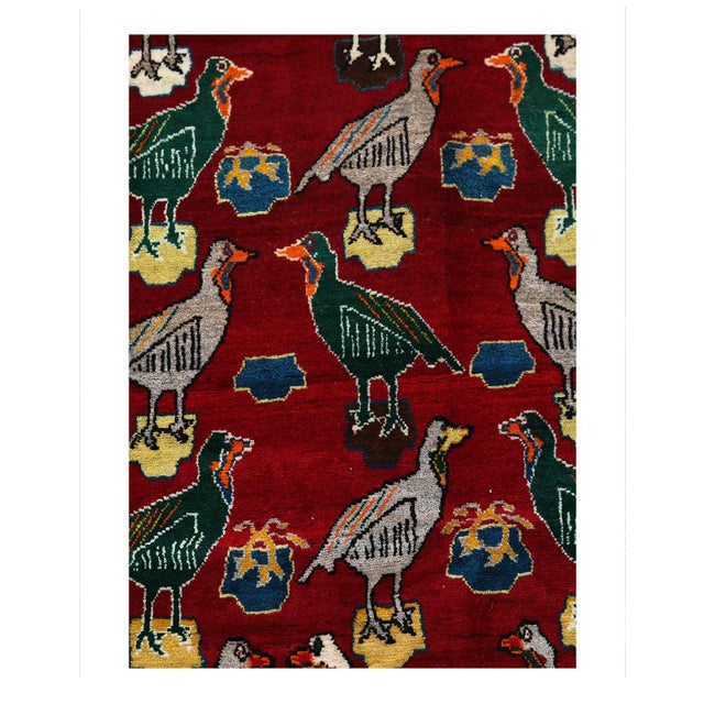 A ruggedly enchanting tale unfolds in the embrace of this hand-knotted wool vintage rug. Imagine the cozy nomad, weaving...
