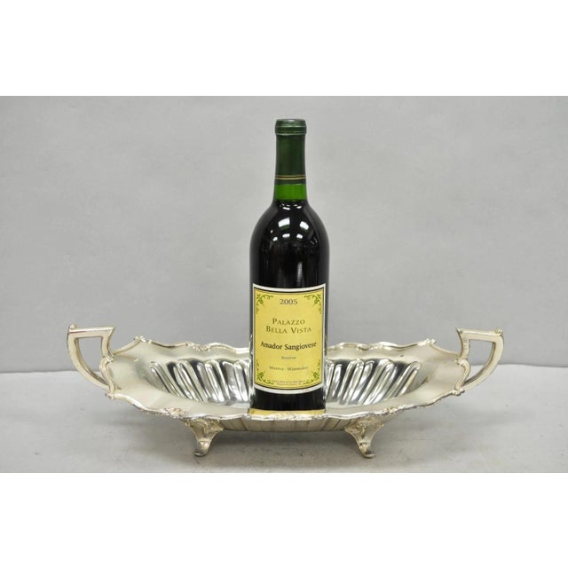 Vintage FB Rogers Victorian Silver Plated Scalloped Centerpiece Fruit Bowl. Circa Mid 20th Century. Measurements: 4.5" H x...