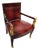 Mid 20th Century Red Leather Empire Style Armchair With Gilded Figures For Sale