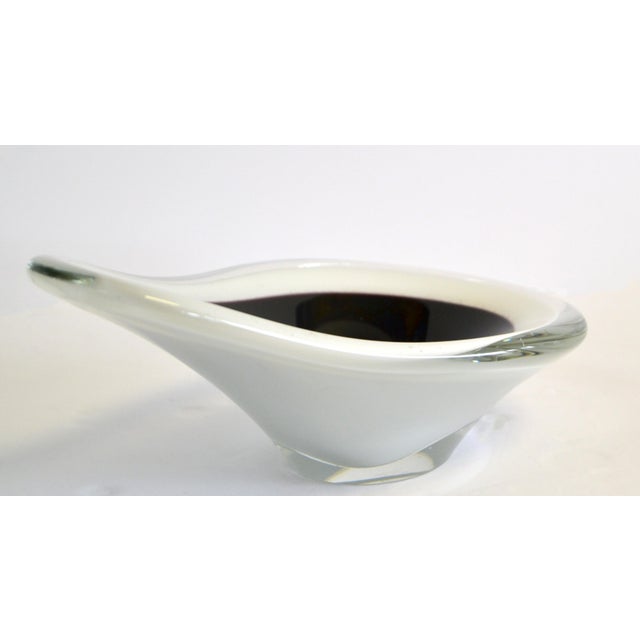1956 Scandinavian Art Glass Bowl designed by Paul Kedelv and made by Flygsfors Coquille. Triple encased clear, black and...