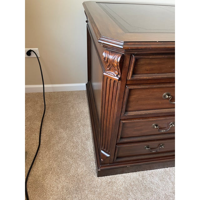 An Executive Desk that has served me well in my office since Feb 1997 from the Ellis line of Sligh Furniture. It is...
