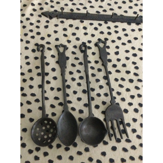 1960s 1960s Vintage Hand Made Cast Iron Utensils With a Matching Decorative Wall Hanger - 4 Pieces For Sale - Image 5 of 7