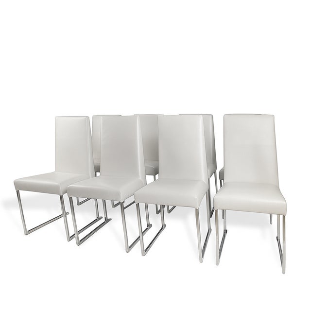 Set of 8 B&B Italia Solo Dining Chairs, designed by Antonio Citterio, showcasing his signature balance of modern elegance...