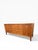 Refined mid-century modern credenza from the Janus Collection by John Stuart, showcasing exceptional craftsmanship and a...