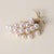 Vintage Mikimoto Cultured Pearl Bouquet Brooch This elegant vintage bouquet brooch from the Mikimoto collection showcases...