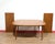 A truly stunning extending dining table with leaves, this Mid Century Modern Skovmand and Anderson Teak Danish piece...