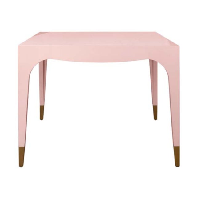Elevate your game room with this sophisticated pink lacquer game table, featuring clean square tapered legs and two...