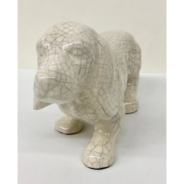 Who let the dogs out???? This little guy will look great sitting on a bookshelf or hanging out in the guest bathroom. He...