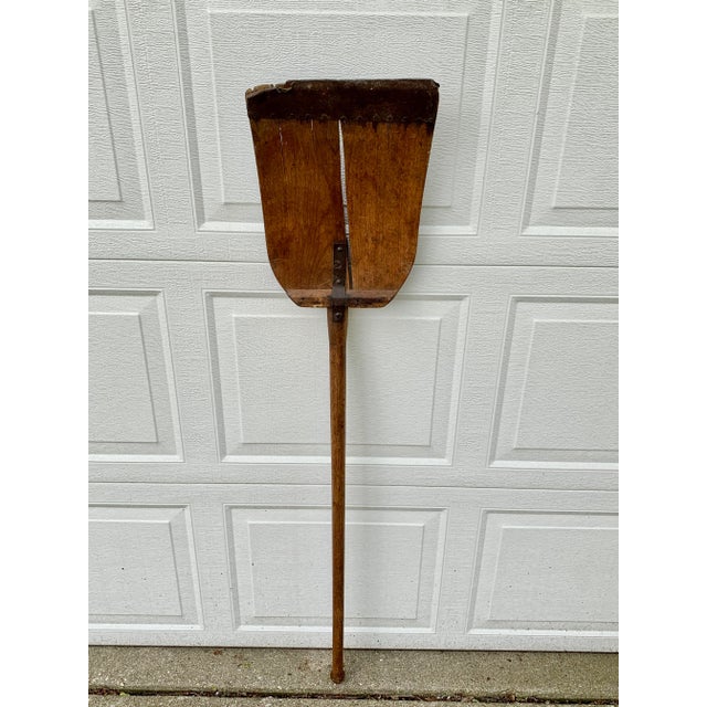 A beautiful antique rustic, farmhouse, or country wooden hand made grain shovel. This would be ideal for an installation...