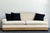 This elegant vintage stacked reed sofa is a refined example of timeless rattan craftsmanship, blending natural texture...