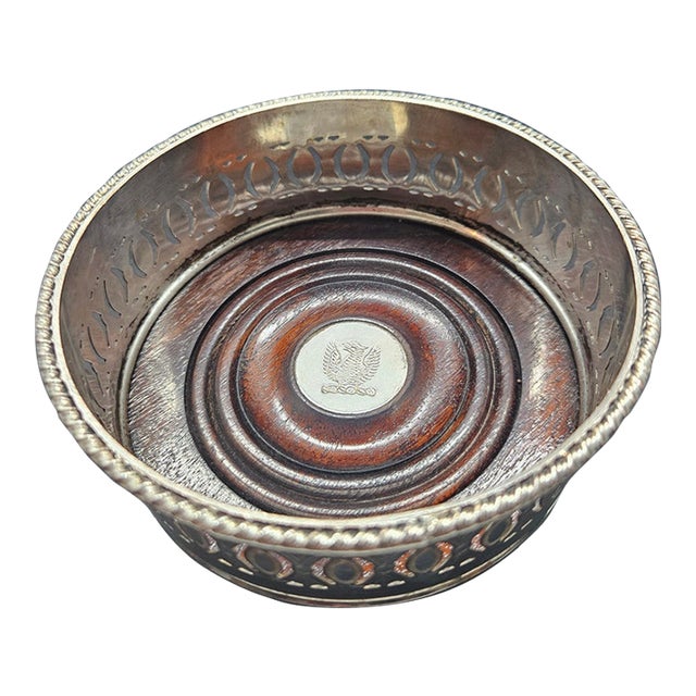 Antique Silver Plate and Wood Wine Bottle Coaster With Silver Phoenix Embossed on Pendant For Sale