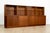 This unique and versatile matching pair of vintage Swedish mid-century modern display cabinets was produced circa 1960....