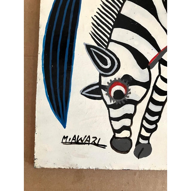 Up for sale is this whimsical depiction of African wildlife painted on hardboard by Bushiri Mrita Awazi. Signed by the...