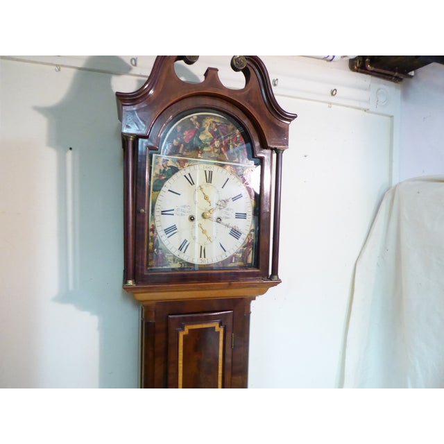 This 19th century Mahogany case clock has all its parts, key, weights, pendulum.