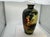 A wonderfully whimsical and highly decorative circa 1940 hand-painted ceramic vase featuring an enchanting scene of monkey...