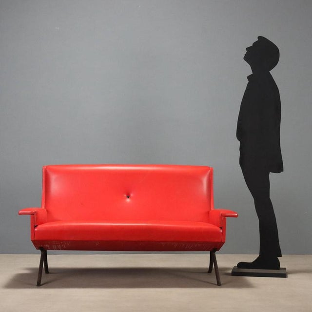 1960s vintage sofa with an eye-catching design typical of the era. The foam padding offers comfort, while the red skai...