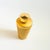 A Mid Century gold-tone aluminum cocktail shaker. The shaker is matte gold in coloring with shiny gold bands and a cap for...