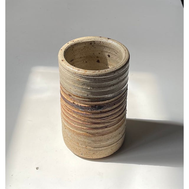 A subtle yet stylish vase in earthy and softly decorated ceramic designed by danish ceramist tue poulsen and made at his...