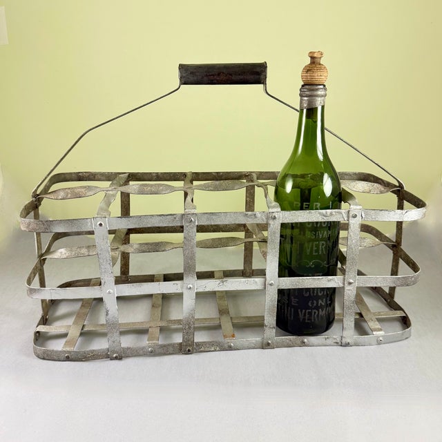 A large French galvanized zinc bottle carrier, with TEN compartments, circa 1900-1920. Unusual to find a carrier that can...
